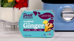 Dorot Gardens Crushed Ginger frozen cubes package, 16 cubes, on kitchen counter.